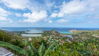 Breathtaking panoramic ocean views of Grand-Cul-de-Sac bay from the lush hillside vantage point of Casa Tigre in Vitet.