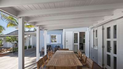 Elegant outdoor covered dining terrace at Villa Citron Vert, seamlessly connecting to the fully equipped gourmet kitchen.