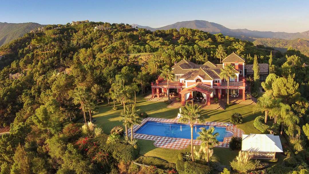 Aerial view of Villa Mirador, an expansive Andalusian-style luxury estate in La Zagaleta with a private pool and hill views.